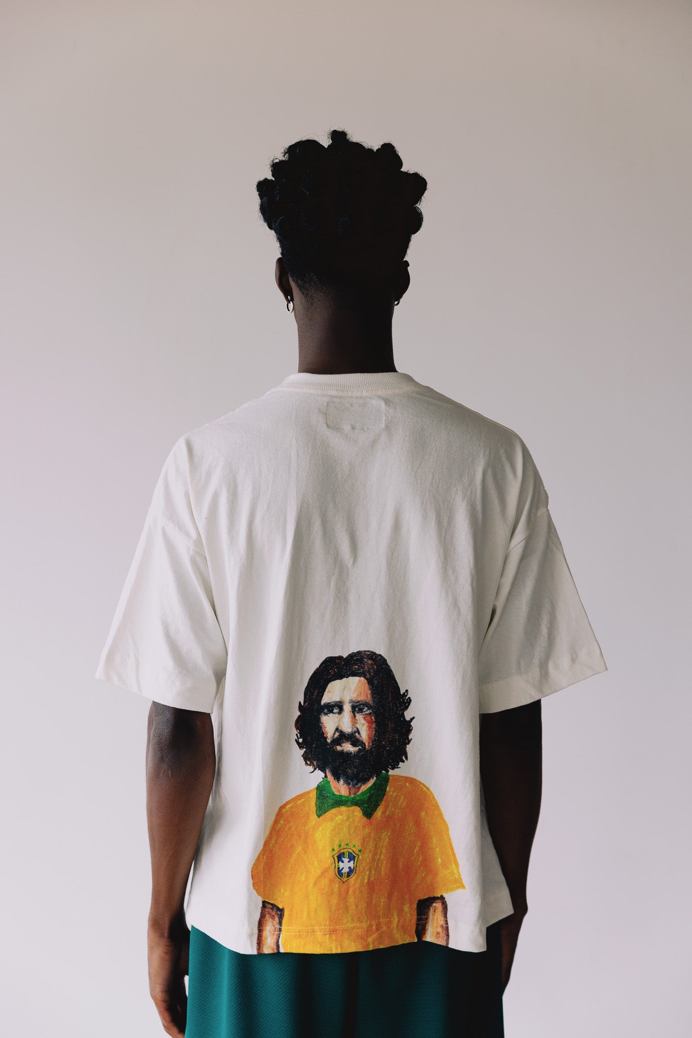 CAMISETA GOD LOVES BRAZIL OFF WHITE